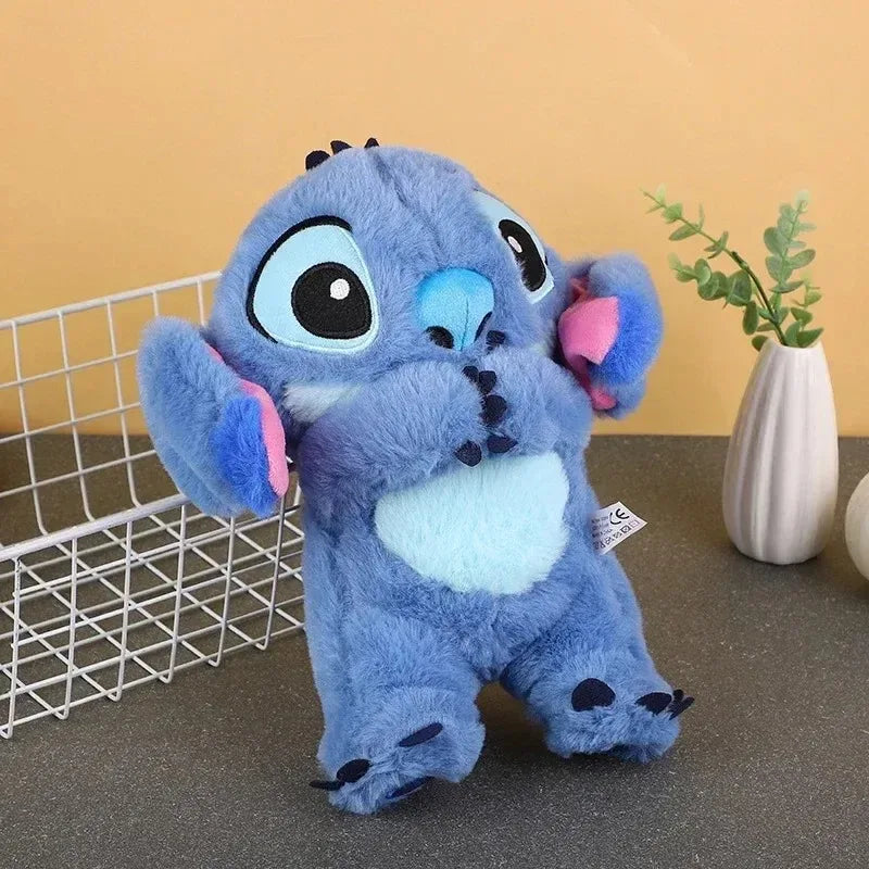 Pelúcia Stitch com movimentos de respiração, luzes e música calmante